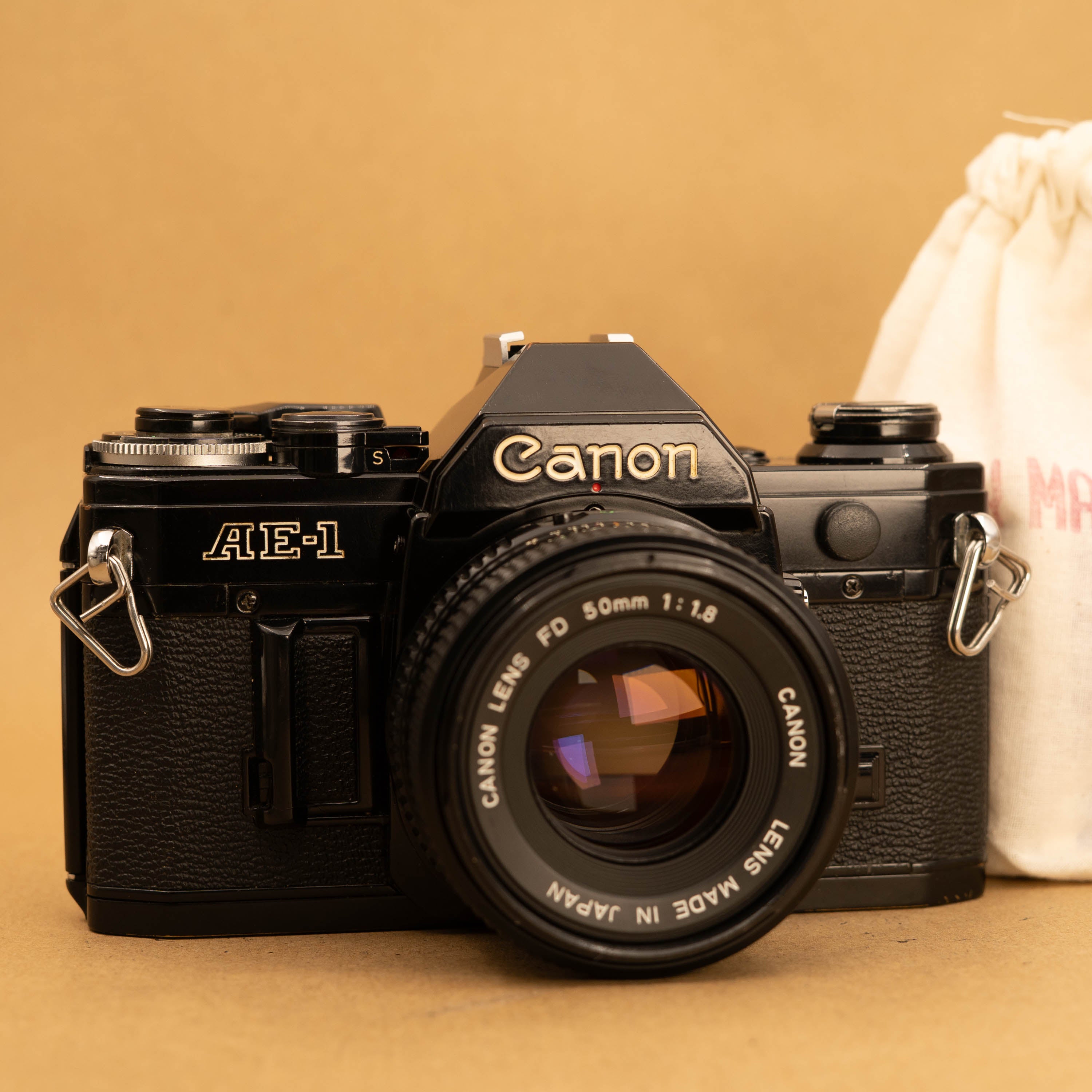 Black Canon AE-1 35mm SLR Film Camera - Refurbished – Cameras By