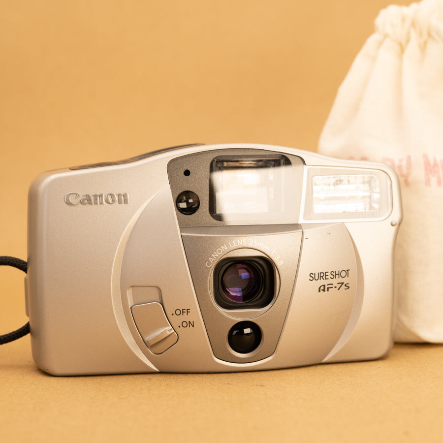 Canon AF-7S シルバー コンパクトフィルムカメラ Canon Sure Shot AF-7S 35mm Point and Shoot Film Camera with Film
