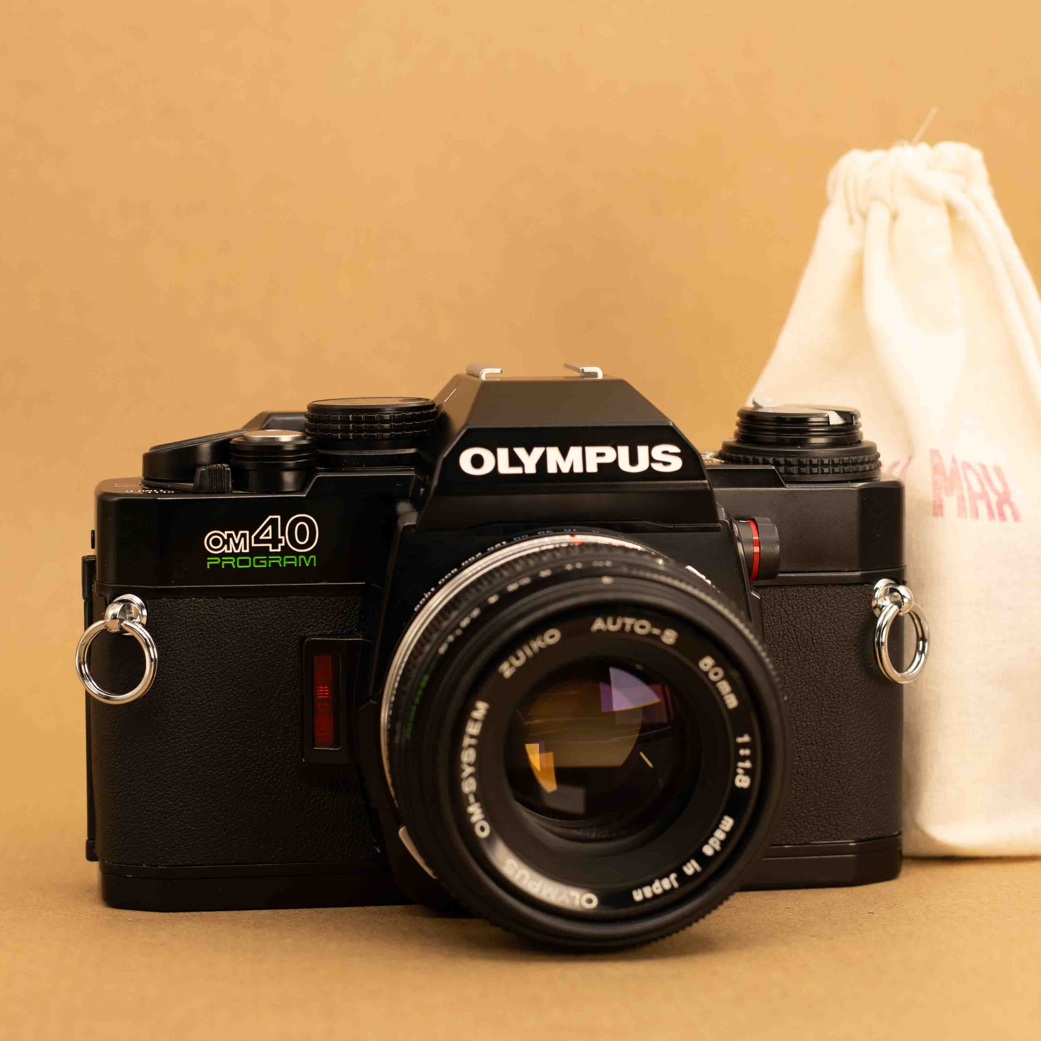 Olympus OM40 Program in Black with 50mm f/1.8 Lens – Cameras