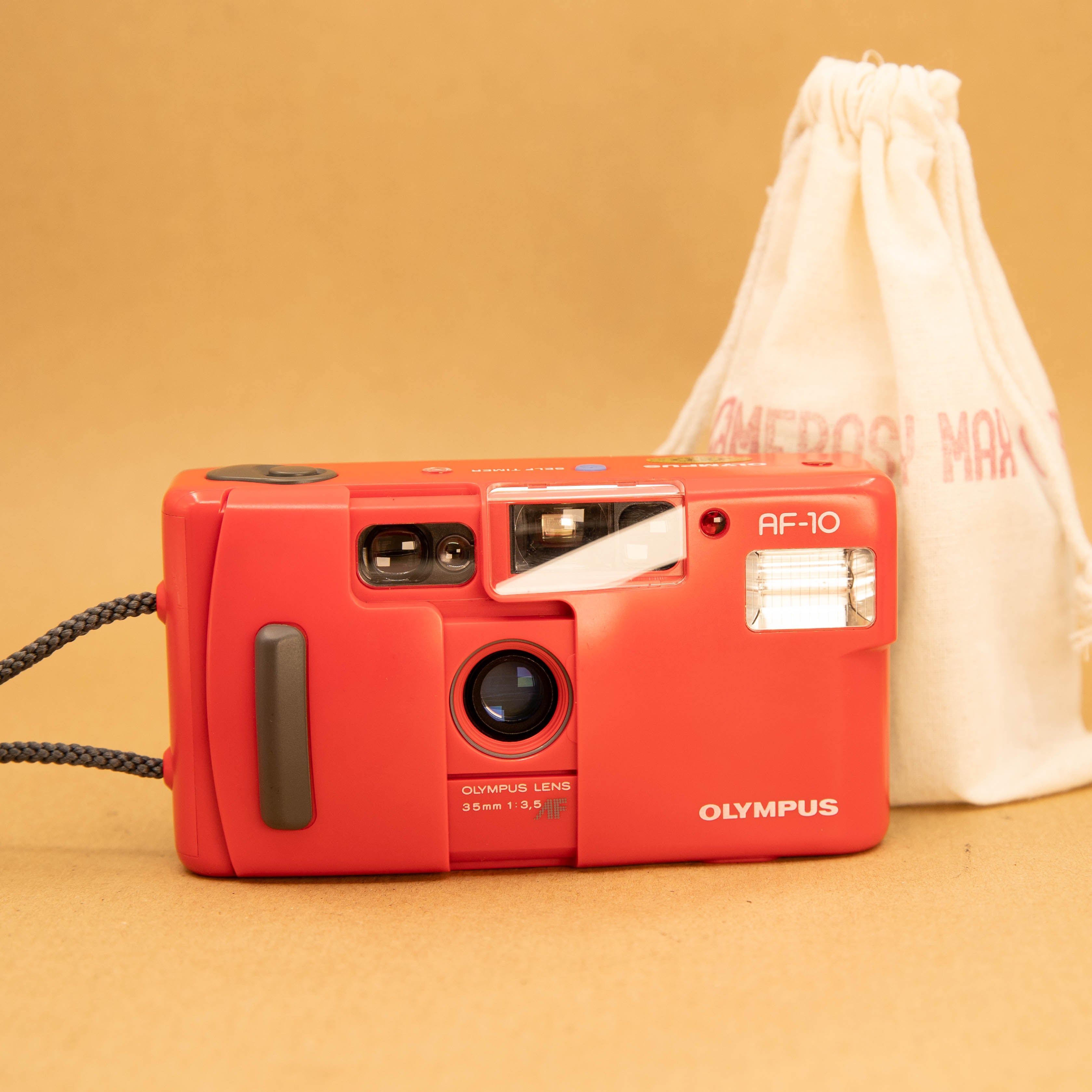 Olympus AF-10 in Red 35mm Point and Shoot Film Camera