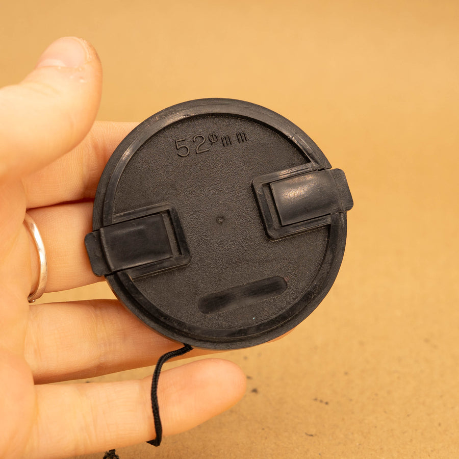 Tapa de lente de 52 mm