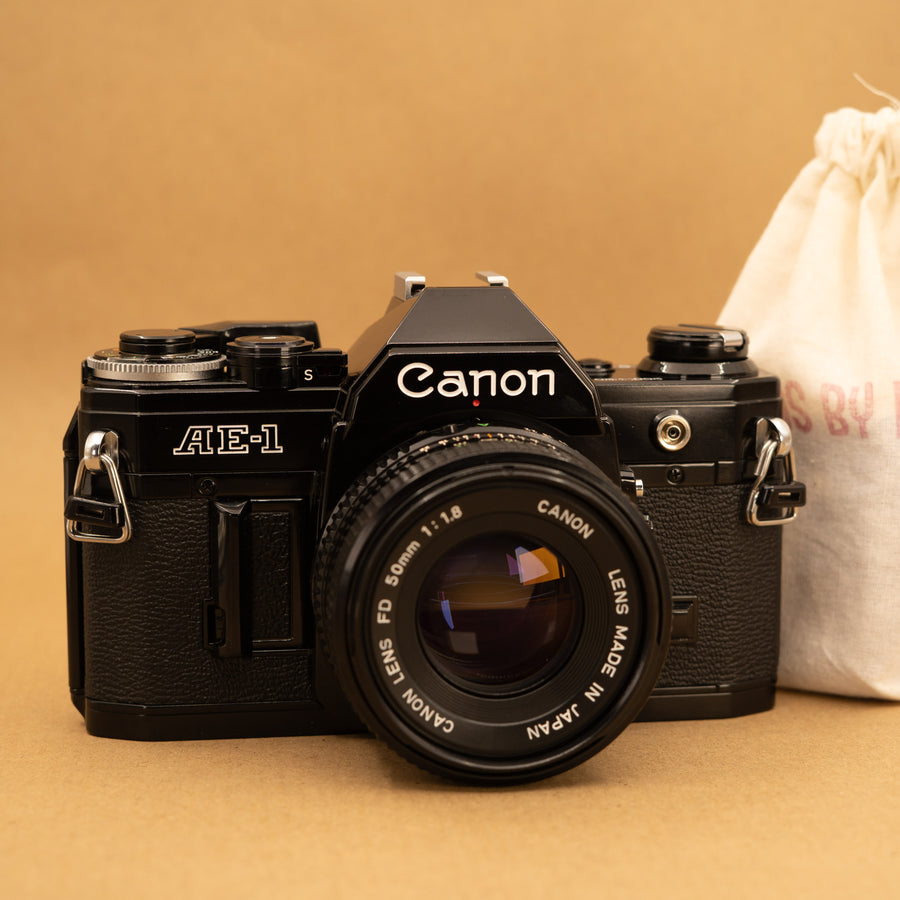 Black Canon AE-1 with 50mm f/1.8 Lens