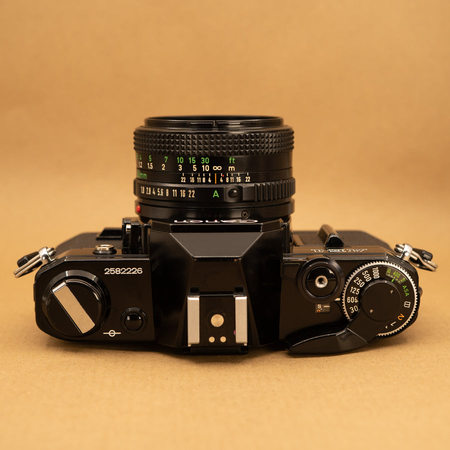 Black Canon AE-1 with 50mm f/1.8 Lens