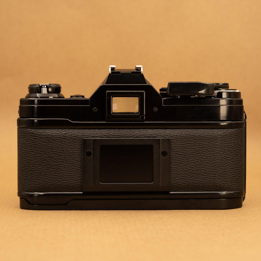 Black Canon AE-1 with 50mm f/1.8 Lens