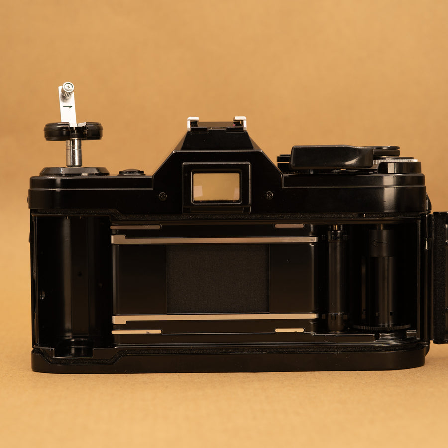 Black Canon AE-1 with 50mm f/1.8 Lens