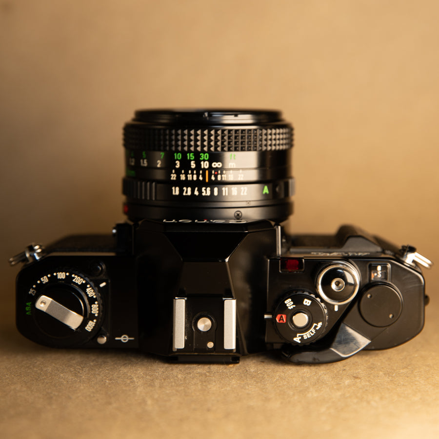 Black Canon AV-1 with 50mm f/1.8 Lens 35mm SLR film camera for beginners