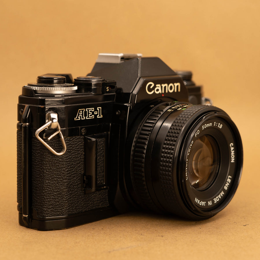 Black Canon AE-1 35mm SLR Film Camera - Refurbished – Cameras By