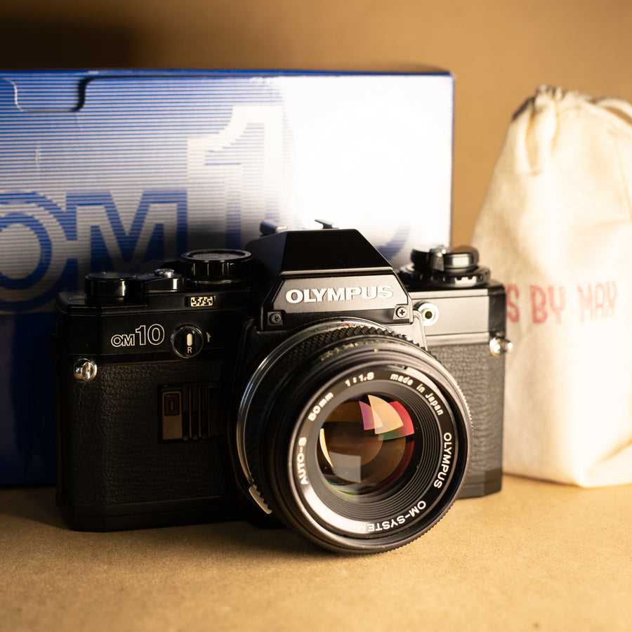 Black Olympus OM10 with 50mm f/1.8 Lens 35mm film camera SLR for beginners