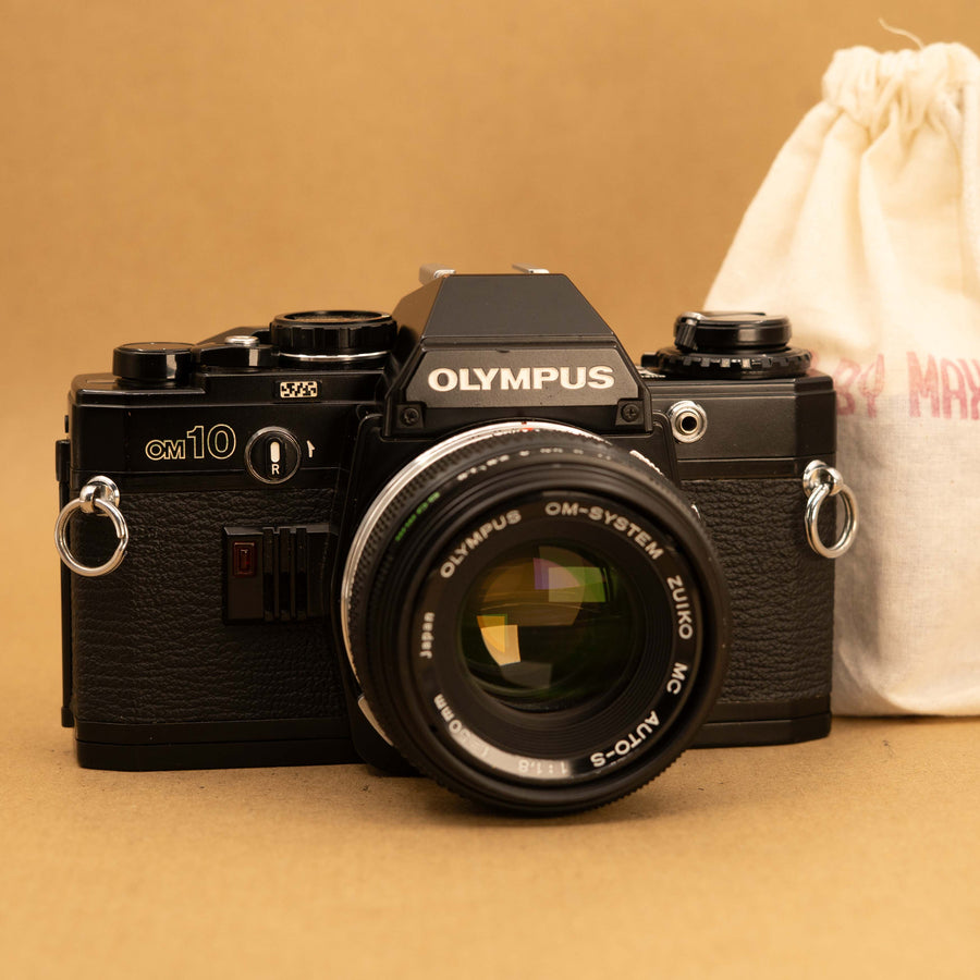 Black Olympus OM10 with 50mm f/1.8 Lens