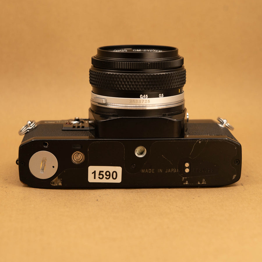 Black Olympus OM10 with 50mm f/1.8 Lens