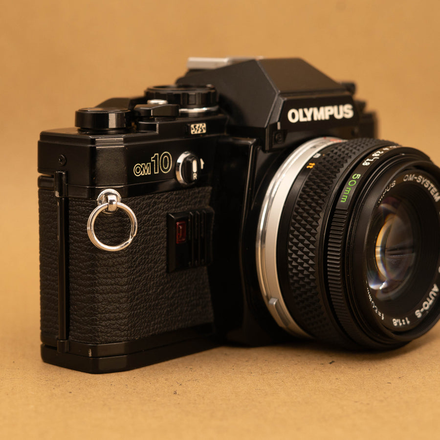 Black Olympus OM10 with 50mm f/1.8 Lens
