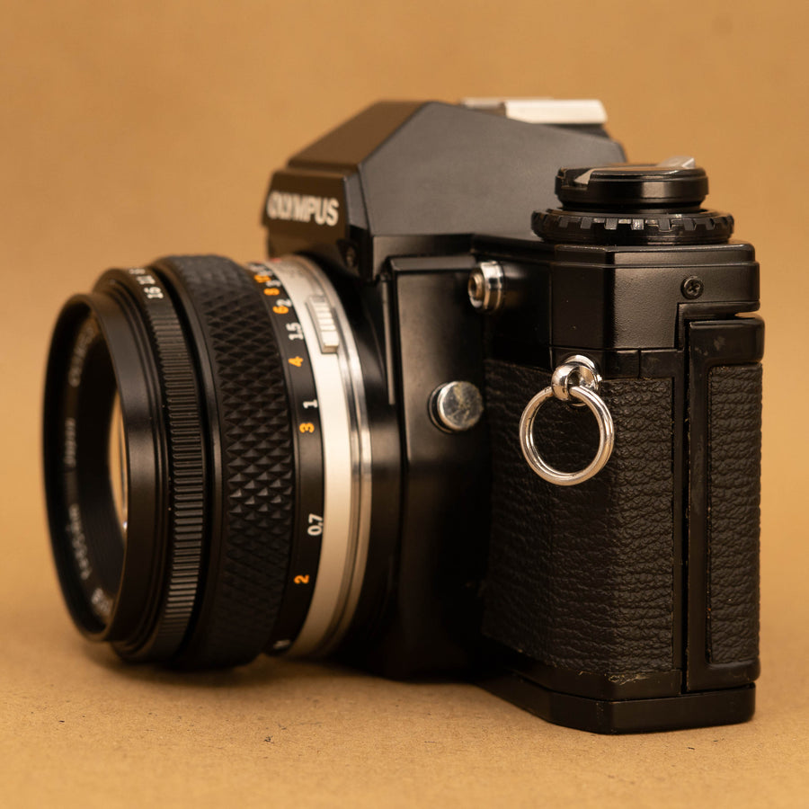 Black Olympus OM10 with 50mm f/1.8 Lens