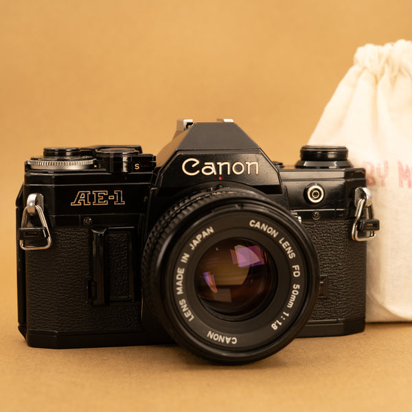 Black Canon AE-1 35mm SLR Film Camera - Refurbished – Cameras By