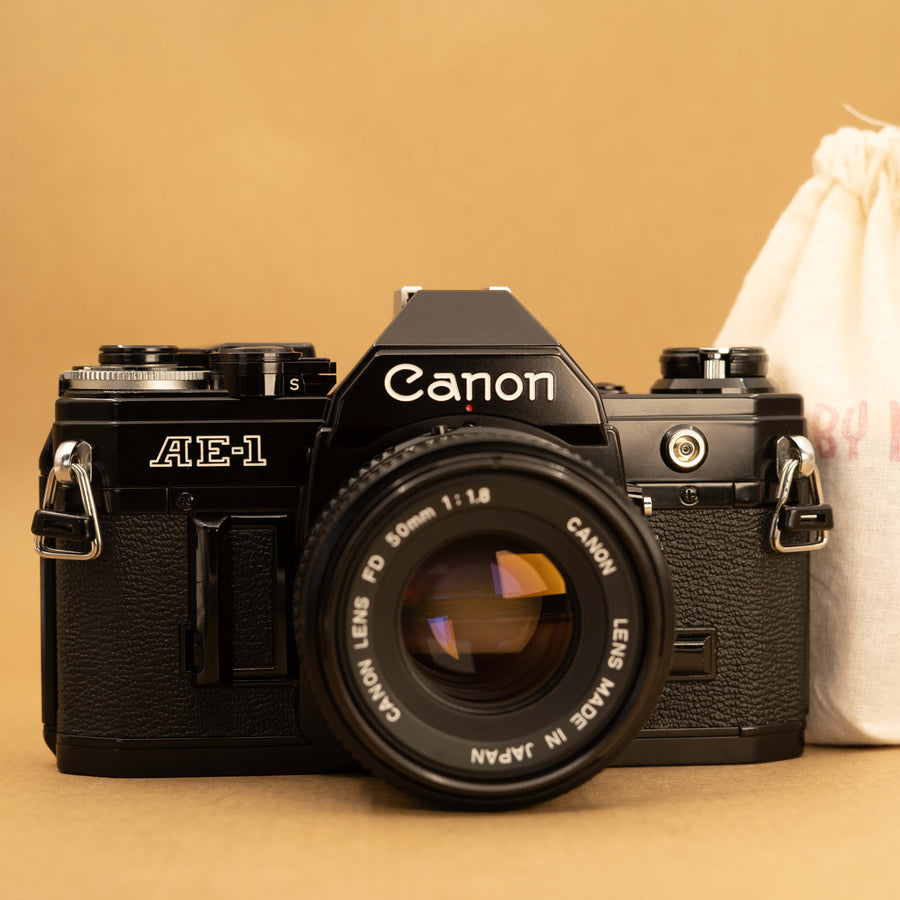 Black Canon AE-1 with 50mm f/1.8 Lens