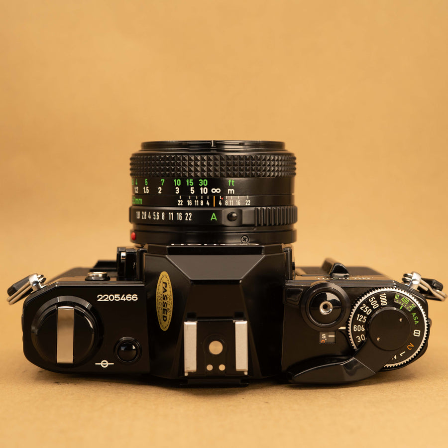 Black Canon AE-1 with 50mm f/1.8 Lens