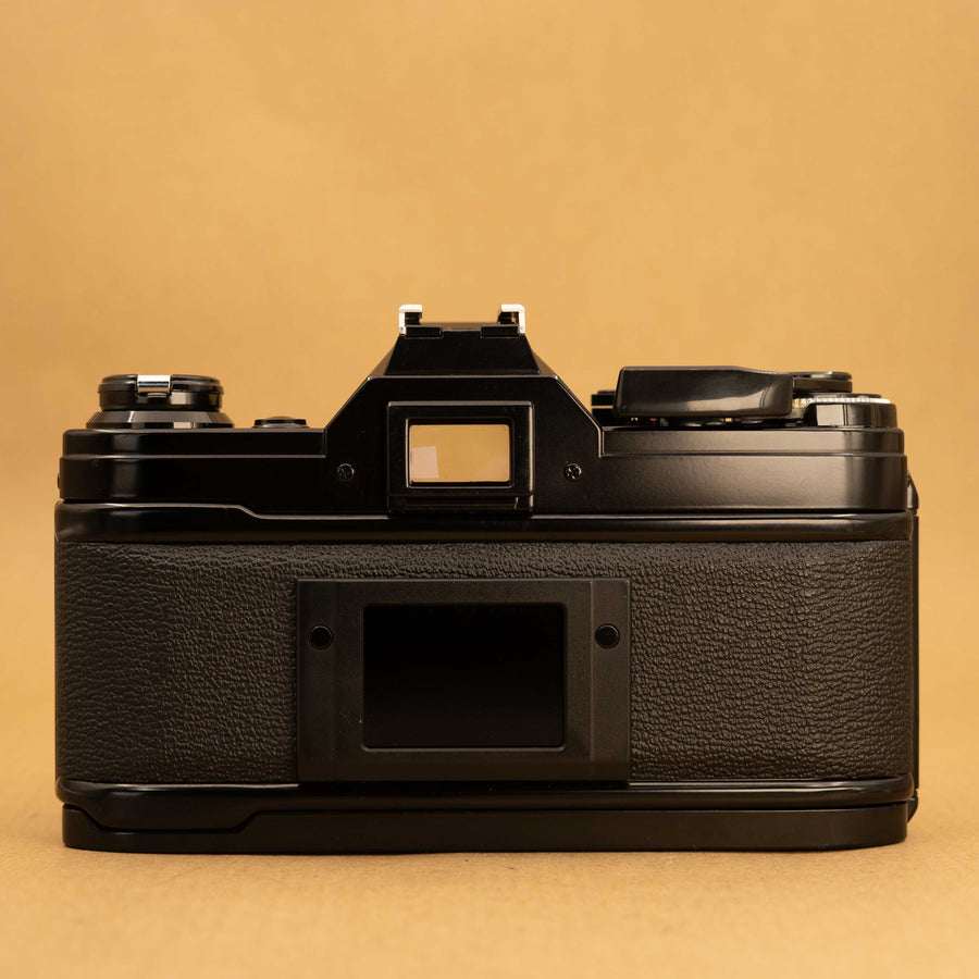 Black Canon AE-1 with 50mm f/1.8 Lens