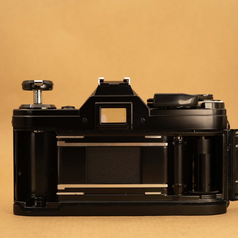 Black Canon AE-1 with 50mm f/1.8 Lens