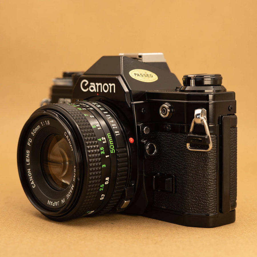 Black Canon AE-1 with 50mm f/1.8 Lens