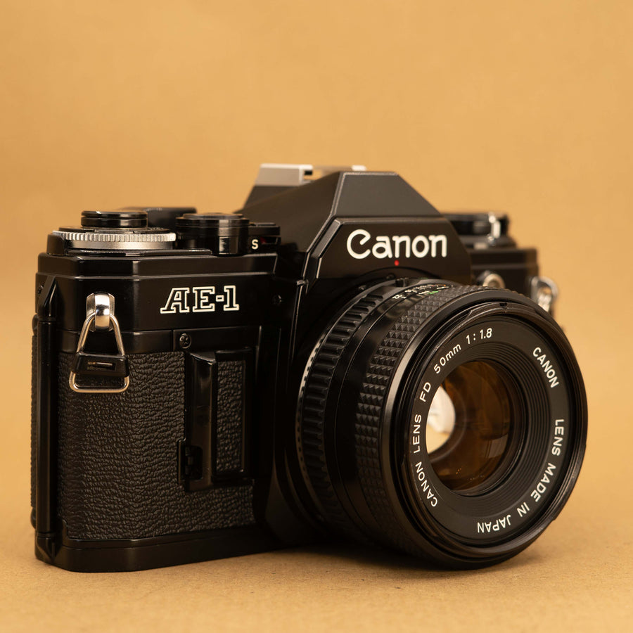 Black Canon AE-1 with 50mm f/1.8 Lens