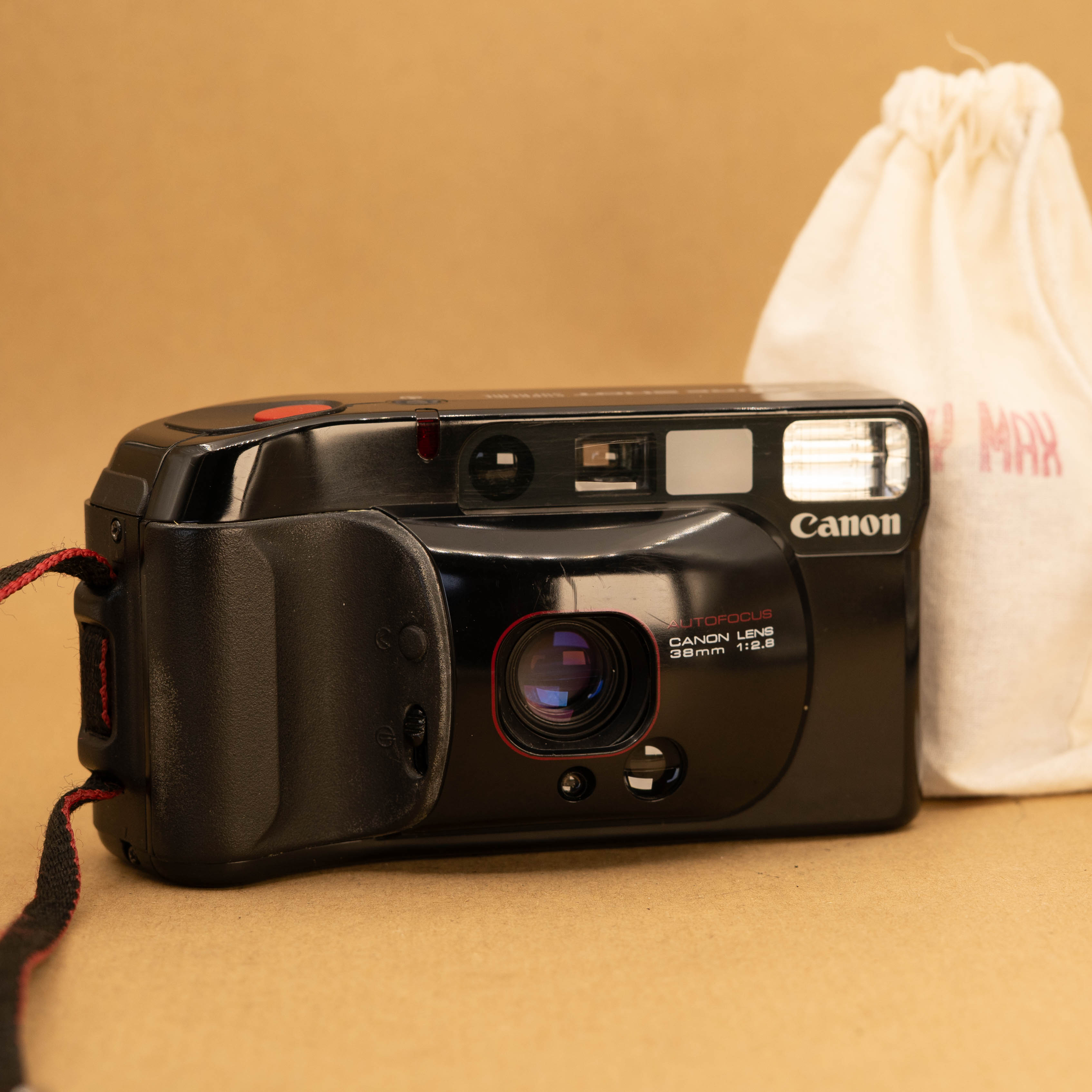 Canon Sure Shot Supreme 35mm Film Camera with Roll of Film