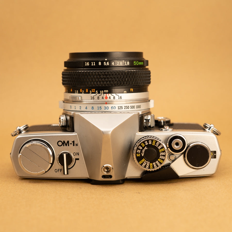 Olympus OM-1n with 50mm f/1.8 Lens – Cameras By Max Ltd