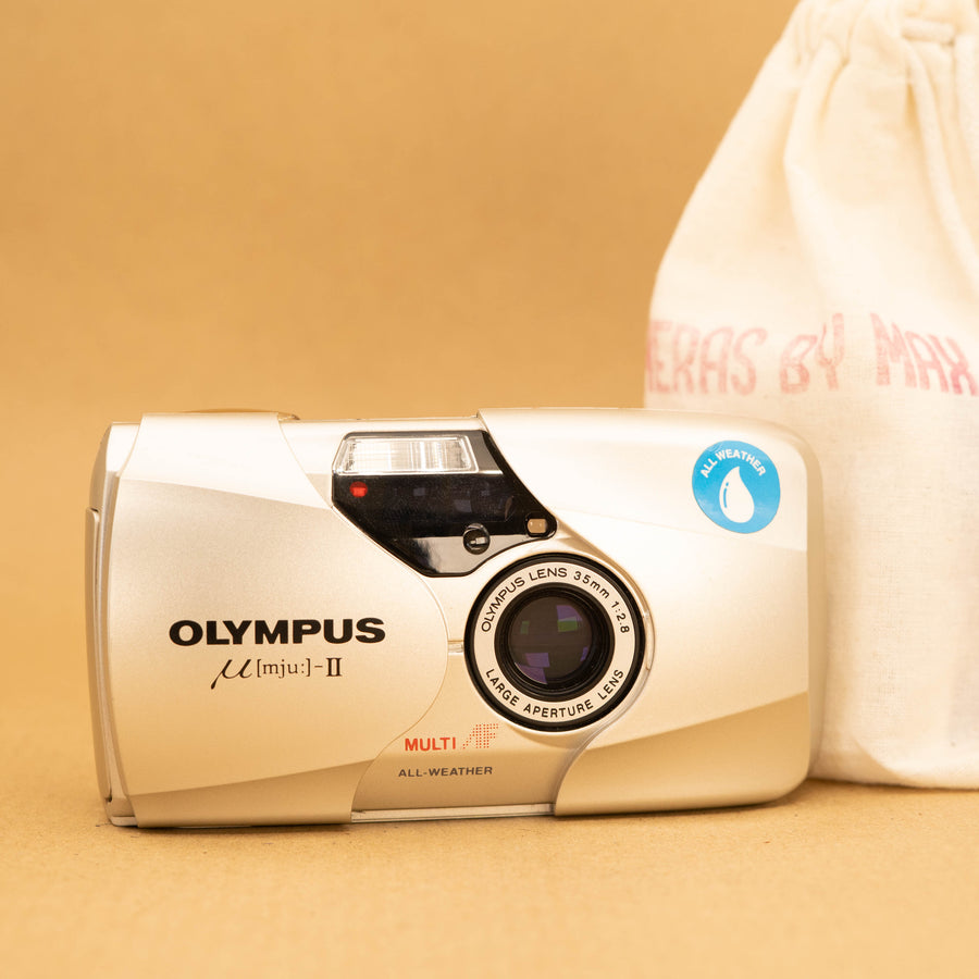Olympus Mju II en Champaña