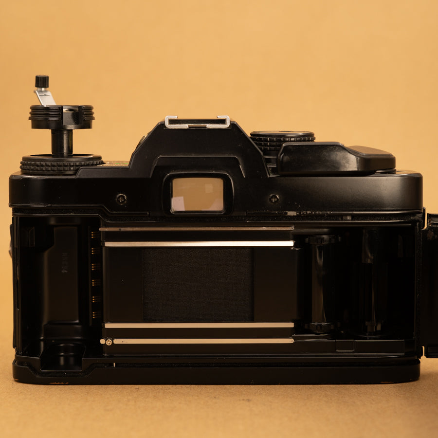 Olympus OM40 Program in Black with 50mm f/1.8 Lens – Cameras By