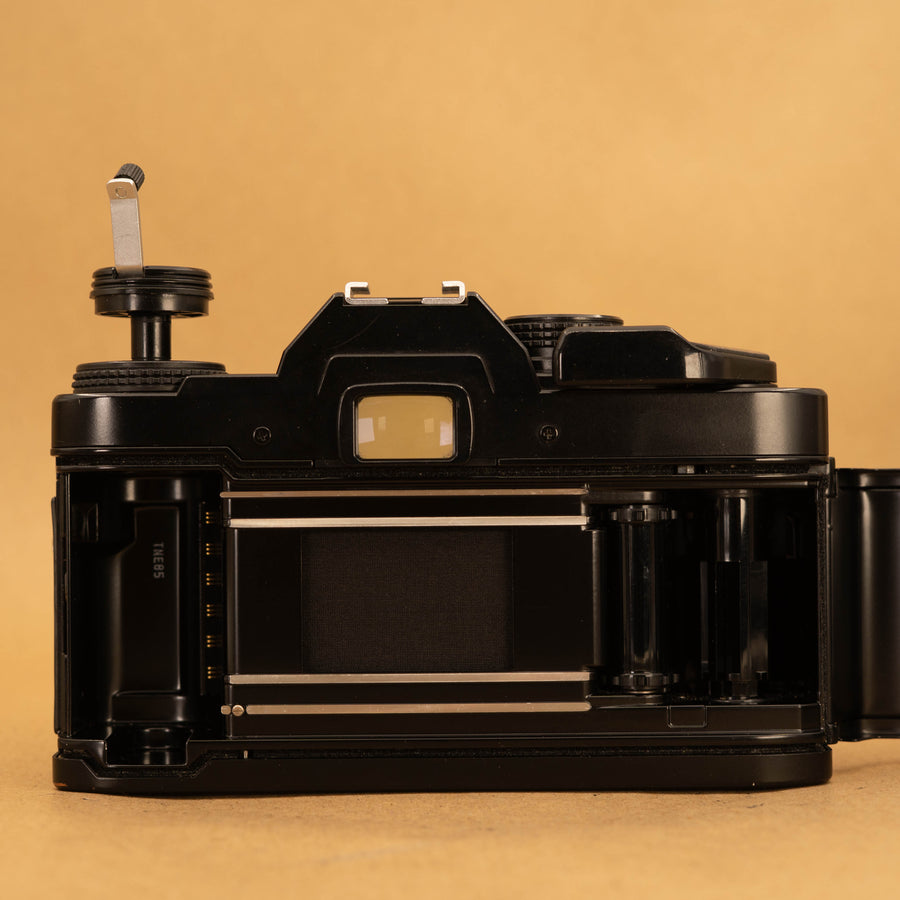 Olympus OM40 Program in Black with 50mm f/1.8 Lens – Cameras By