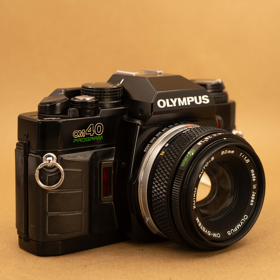 Olympus OM40 Program in Black with 50mm f/1.8 Lens – Cameras By