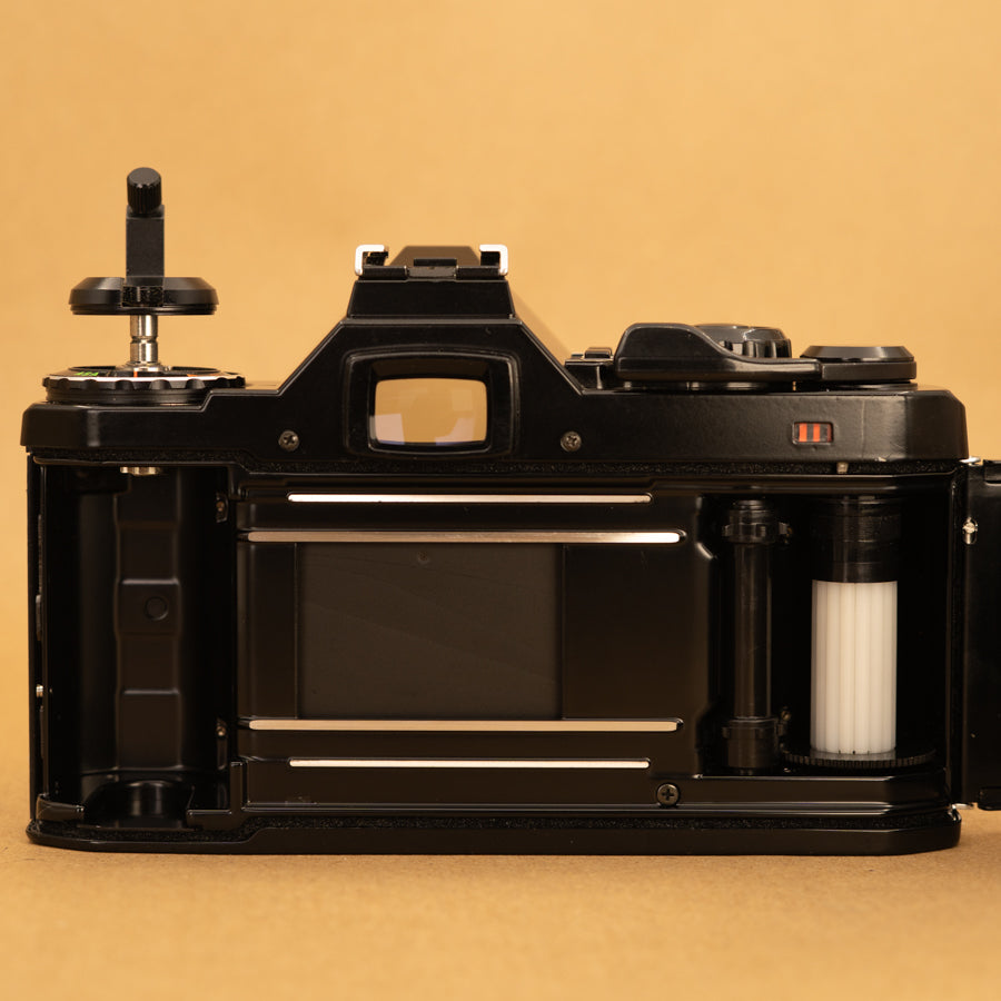 Black Pentax ME Super with 50mm f/2 Lens and Roll of Film