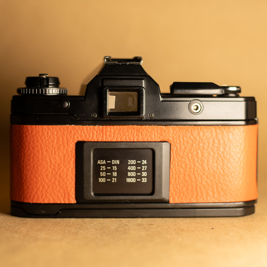 Yashica FX-D en orange avec objectif 50 mm f/2