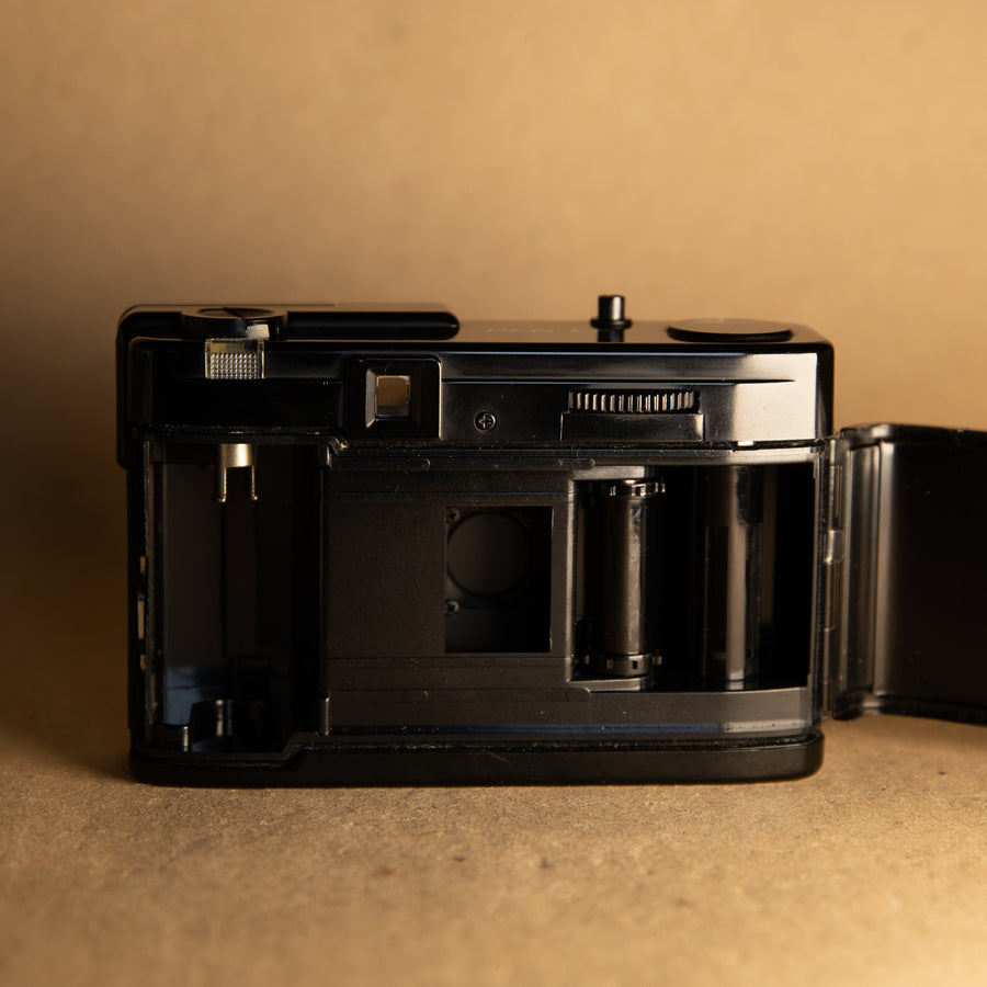 Olympus Pen EF 35mm film camera half-frame in green