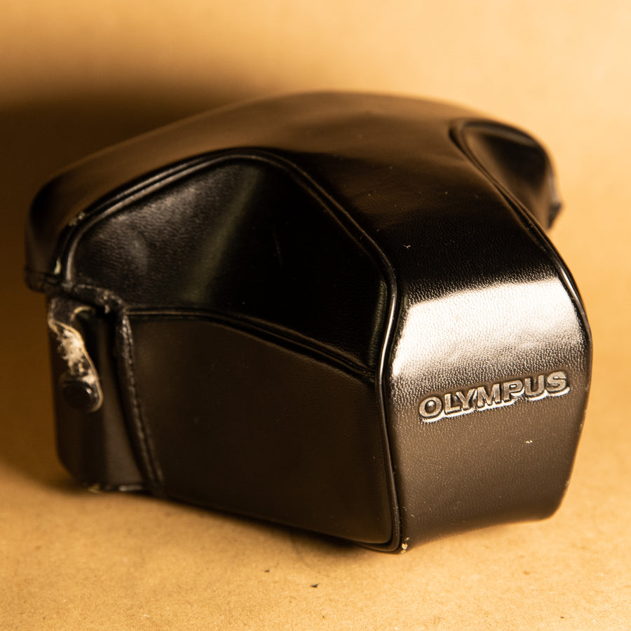 Black Olympus SLR film camera case for OM SLR 35mm film camera